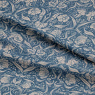 Elegant Sophia Linen Curtain Fabric - Wedgewood draping gracefully in a living room