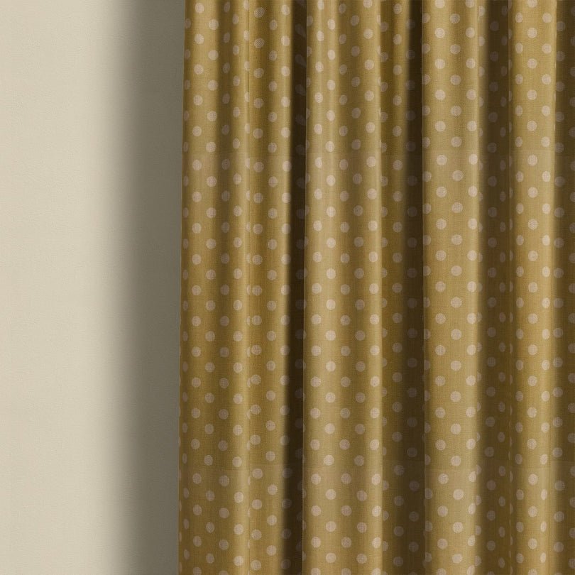Ochre spot curtain fabric with playful polka dot design, ideal for modern living room or bedroom curtains