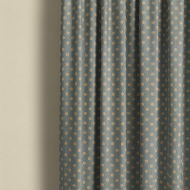 Teal spot curtain fabric featuring classic polka dot pattern, perfect for stylish contemporary window treatments