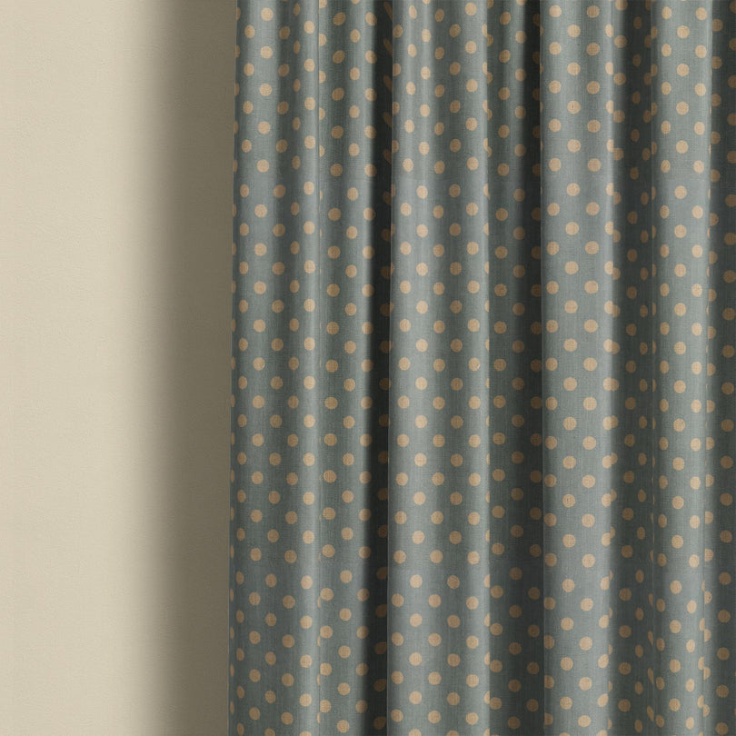 Teal spot curtain fabric featuring classic polka dot pattern, perfect for stylish contemporary window treatments