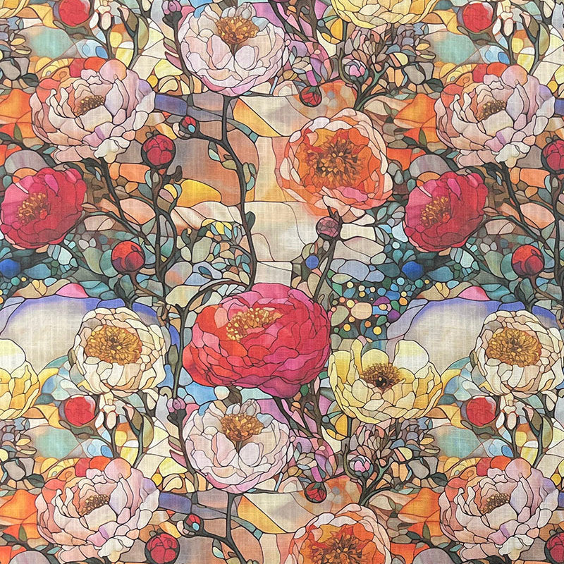 Beautiful stained glass fabric featuring vibrant colors and intricate patterns for use in quilting and home decor projects