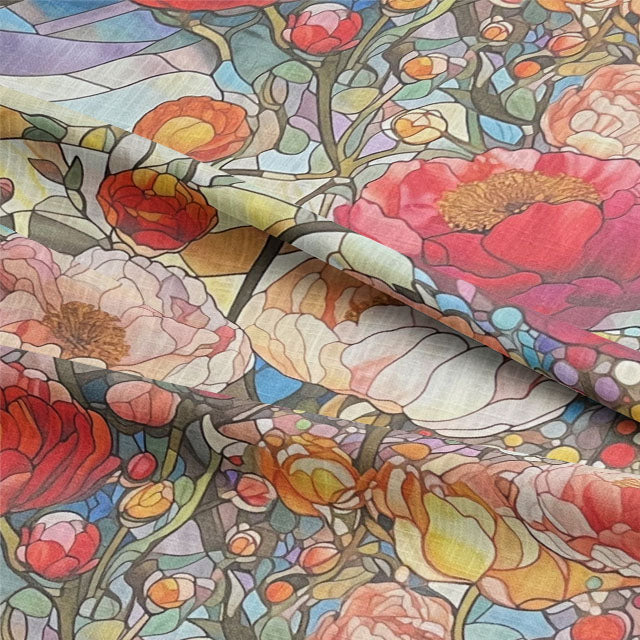 Beautiful and vibrant stained glass fabric with intricate patterns and rich colors