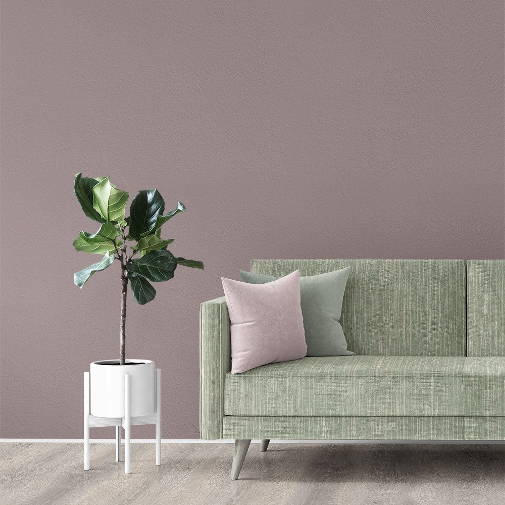 Tampa Sage Upholstery Fabric on sofa – calming green-toned fabric for contemporary soft furnishings.
