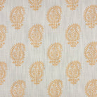 Teardrop Paisley Linen curtain fabric with warm ochre paisley pattern on a natural linen background.