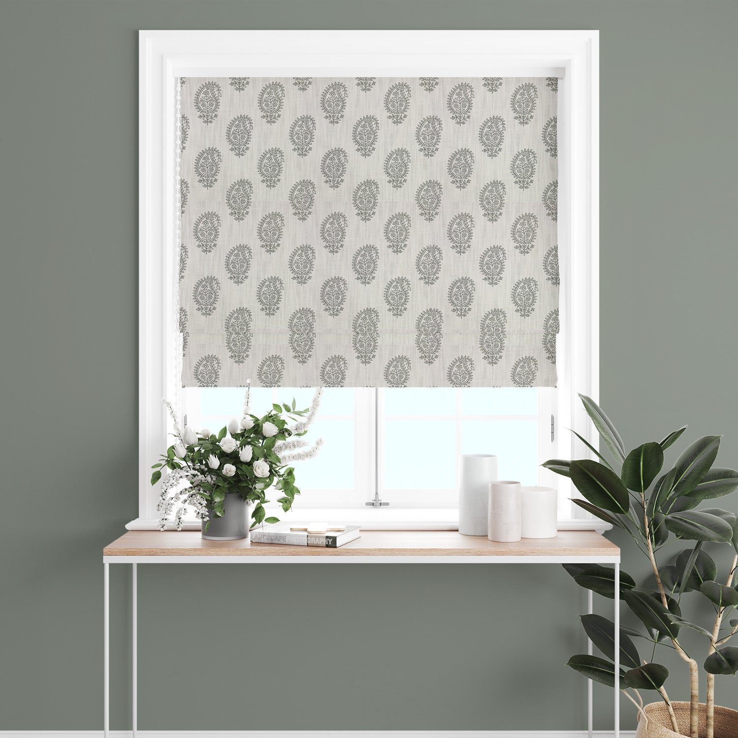 Teardrop Paisley Linen curtain fabric in sage green, styled as a window blind for elegant and calming interiors.