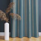 Sky blue curtain made from linen with painterly stripe layout