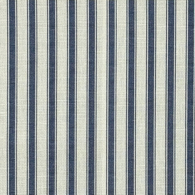 Flat image of Ticking Stripe Upholstery Fabric in Indigo blue with bold, printed stripes ideal for traditional interiors.