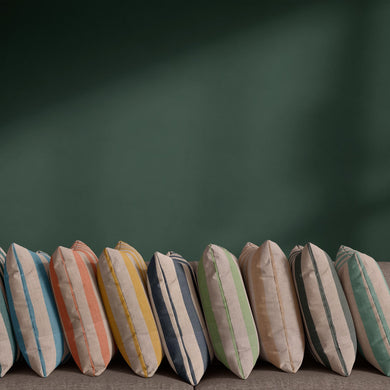 Tirso striped linen curtain fabric shown in 11 colourways with painterly stripe design