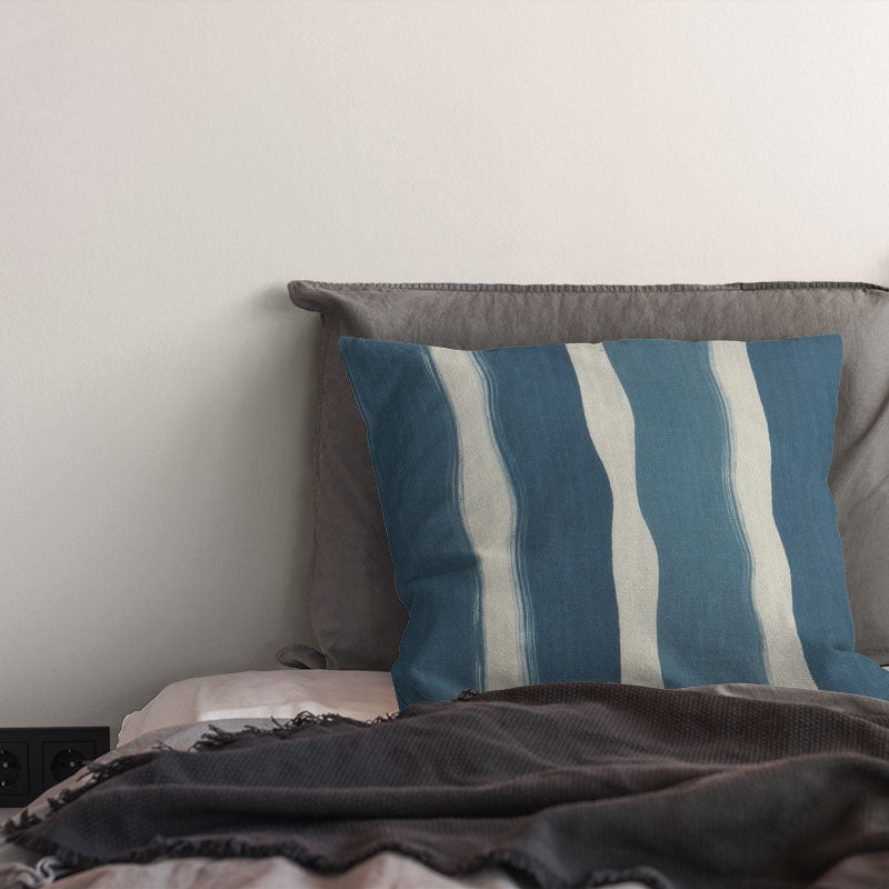 striped curtain fabric cushion in deep marine teal tones with soft vertical stripe pattern on linen blend curtain fabric