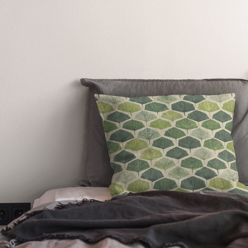 Verdant Leaf Linen Cushion on bed – green leaf curtain fabric styled in bedroom setting