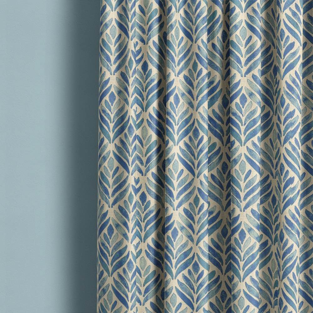 A close-up image of watercolour leaves upholstery fabric in shades of green and blue, perfect for adding a natural and artistic touch to any furniture or home decor project
