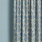 A close-up image of watercolour leaves upholstery fabric in shades of green and blue, perfect for adding a natural and artistic touch to any furniture or home decor project