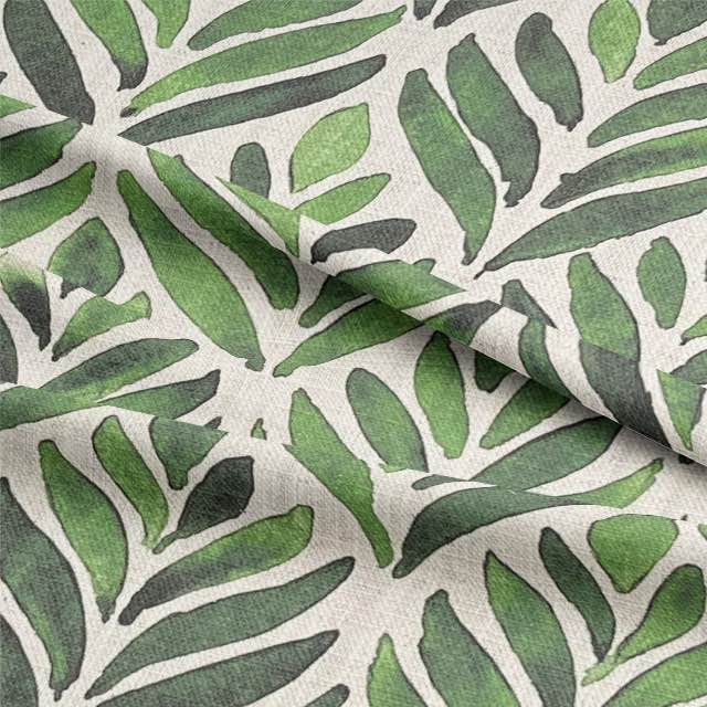 Watercolour leaves upholstery fabric featuring vibrant green and blue leaf pattern on a white background, perfect for adding a natural touch to any furniture piece