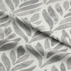 Beautiful watercolour leaves fabric with vibrant green and blue hues for craft and sewing projects