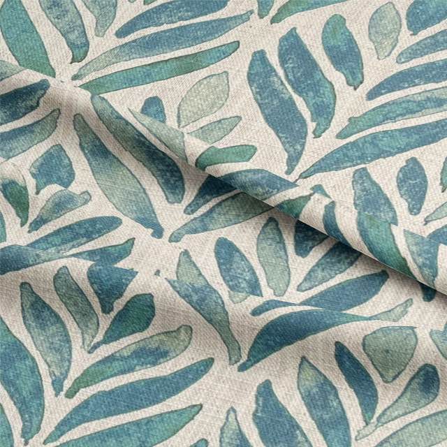 Watercolour Leaves Upholstery Fabric - a beautiful and vibrant floral print fabric with shades of green, blue, and yellow, perfect for adding a touch of nature to any home decor project