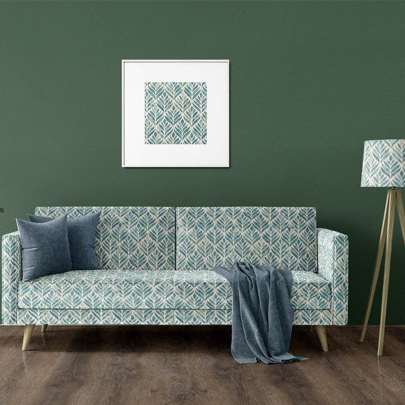 Watercolour leaves upholstery fabric featuring vibrant green and blue leaf pattern on a white background, perfect for adding a natural touch to any home decor project
