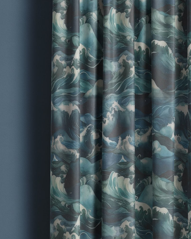 Waves Ink curtain fabric hanging in soft folds showing deep blue and teal wave pattern