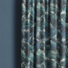 Waves Ink curtain fabric hanging in soft folds showing deep blue and teal wave pattern
