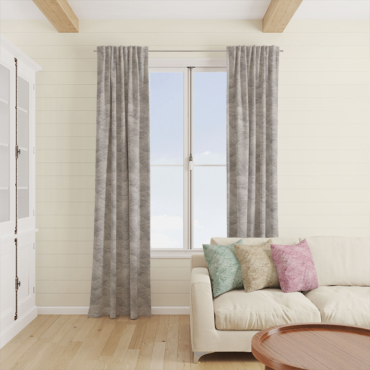 Whitby wave pattern curtain fabric styled as full-length curtains – 100% cotton coastal curtain fabric in modern interior