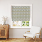 Olive floral curtain fabric fitted as a blind in a traditional setting