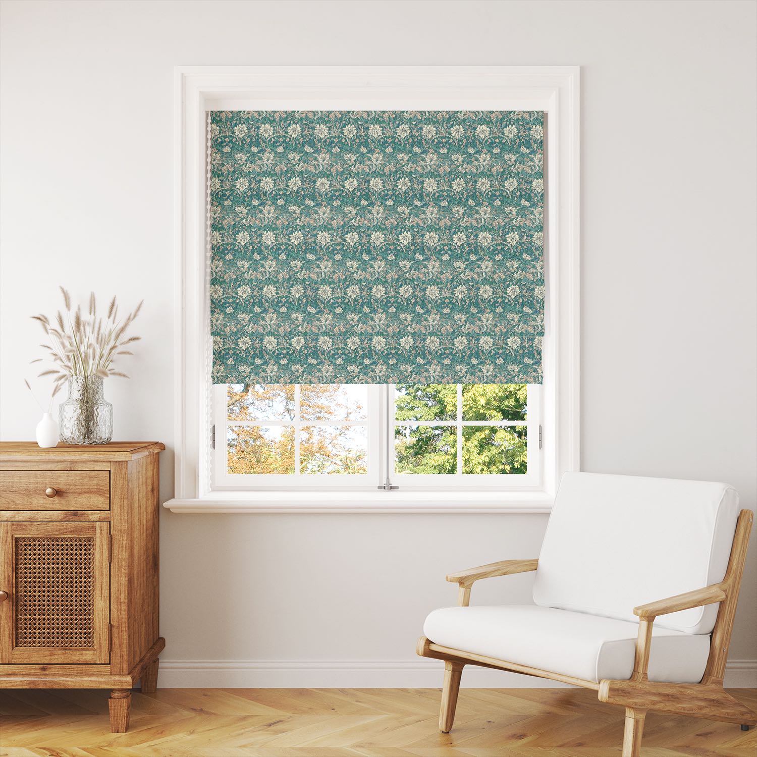 Teal floral curtain fabric styled as a window blind