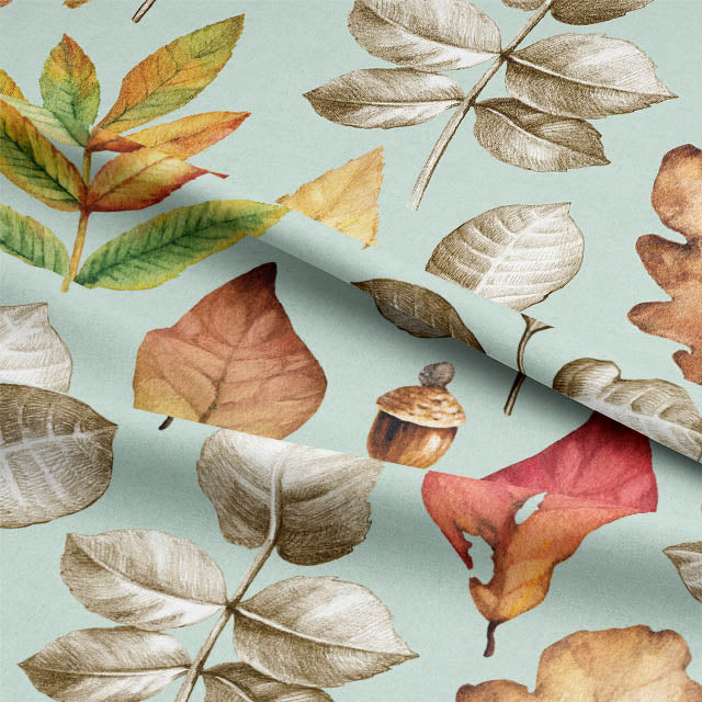Close up of lagoon blue acorns and leaves cotton curtain fabric
