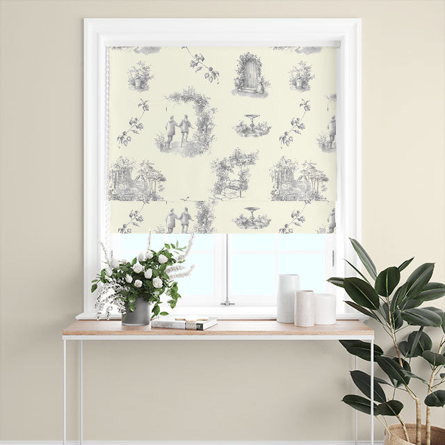  A detailed image of the Aquitaine Toile Cotton Curtain Fabric in Grey Ivory, displaying its beautiful grey and ivory color combination and classic French toile design
