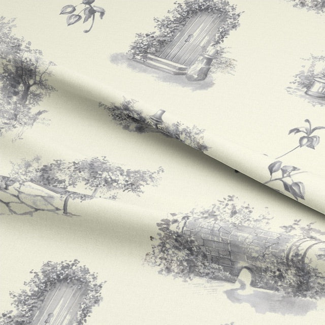  A full-length image of the Aquitaine Toile Cotton Curtain Fabric in Grey Ivory, hanging elegantly and adding a touch of timeless sophistication to any room