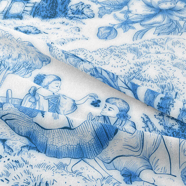 Elegant French-inspired fabric featuring pastoral scenes and delicate floral motifs in a classic blue and white color palette