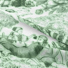 Traditional Auvergne Toile De Jouy Fabric in Green, featuring intricate patterns and charming countryside scenes