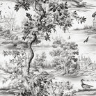 Avignon Toile Linen Curtain Fabric - Black draped on a window in a cozy living room setting