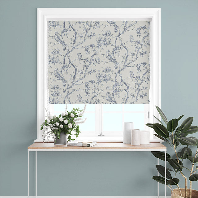 Bilberry Linen Curtain Fabric - Blue hanging in a living room