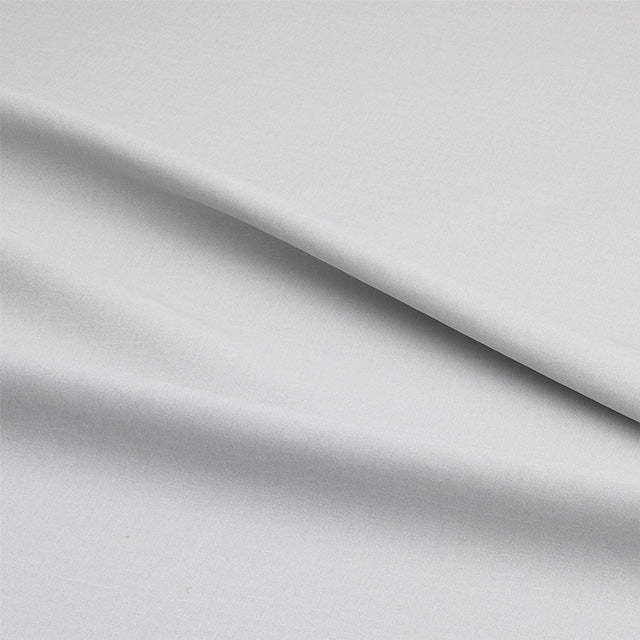 White blackout thermal curtain lining providing complete light blockage and insulation