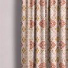 Linen curtain fabric in warm terracotta shade with boho pattern
