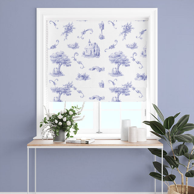 Blue curtain fabric featuring delicate scenes of rural life in the French countryside