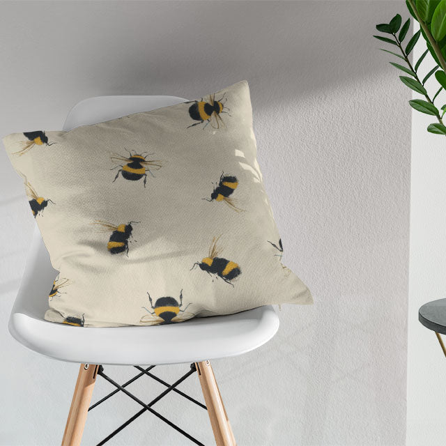  Bumble Bee Cotton Curtain Fabric - Linen being draped over a window in a cozy bedroom