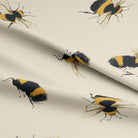 Close-up shot of the Bumble Bee Cotton Curtain Fabric - Linen fabric texture