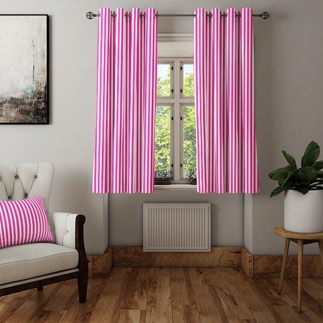 A roll of Candy Stripe Cotton Curtain Fabric in Cerise, ready to be customized for window treatments or home decor projects