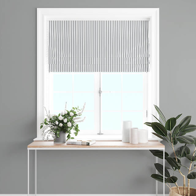 Grey Candy Stripe Cotton Curtain Fabric draping elegantly on a window