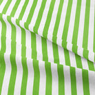 Close-up of green fabric with white candy stripes
