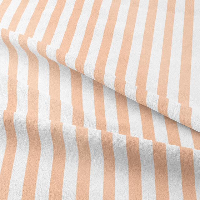 High-quality peach-colored cotton fabric printed with candy stripe pattern