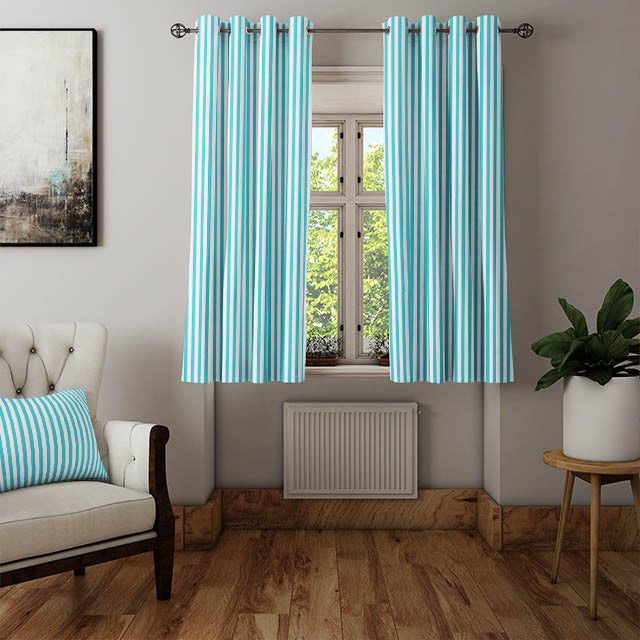 High-quality cotton fabric in turquoise with colorful candy stripes for curtains or upholstery