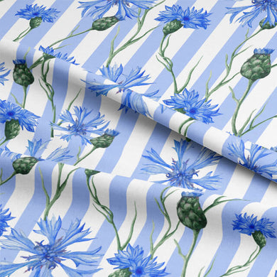 Blue cornflower stripe cotton curtain fabric with a textured pattern