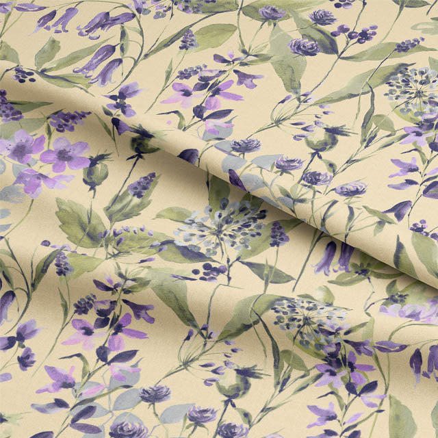 Close-up of Country Garden Butter fabric with floral motif on a linen blend