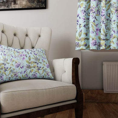 Linen curtain and cushion made in Country Garden fabric in sky blue with soft lilac floral and green leaf print.