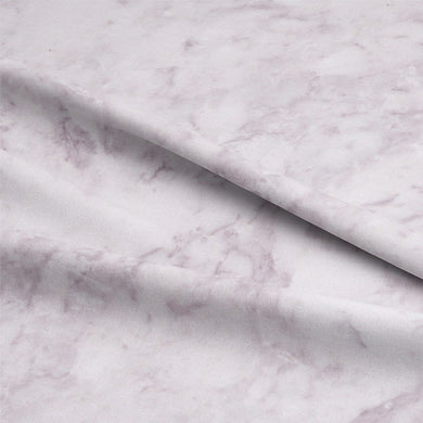 Close-up of Dapple Cotton Curtain Fabric in Rich Amethyst Shade