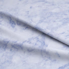 Close-up of high-quality Dapple Cotton Curtain Fabric in Blue