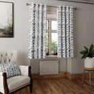 Delilah Cotton Curtain Fabric in Grey swatched against a neutral background, showcasing its versatility and timeless appeal
