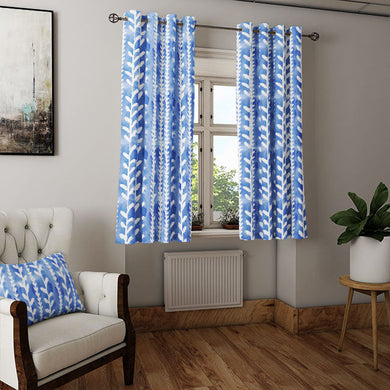 Delilah Cotton Curtain Fabric - Royal Blue, beautifully draping over a window, creating a stunning visual impact