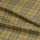 High-quality linen curtain fabric featuring a classic plaid pattern in ochre